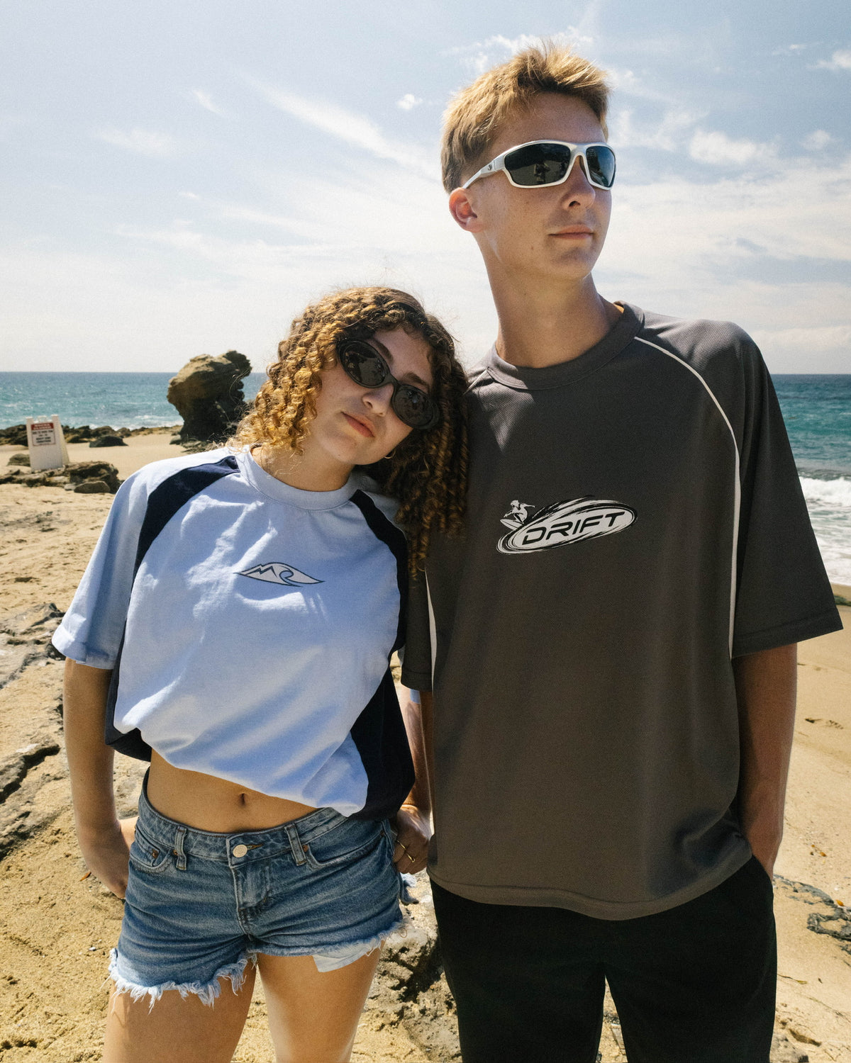 Driftmere tees worn on the coast